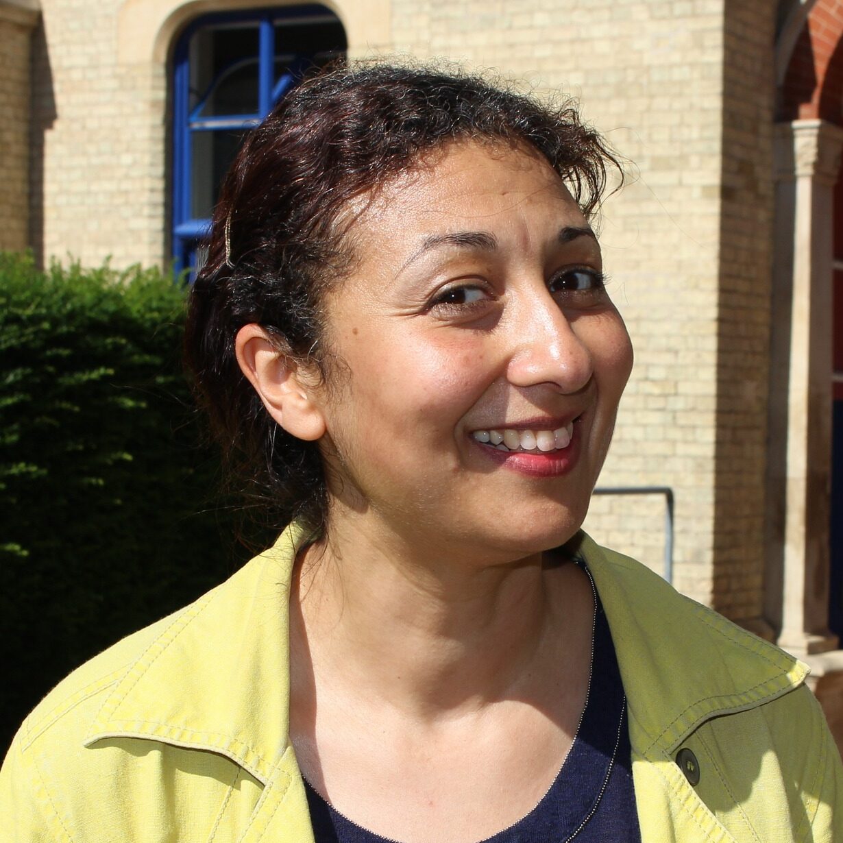 Headshot of Dr Professor Magda Osman