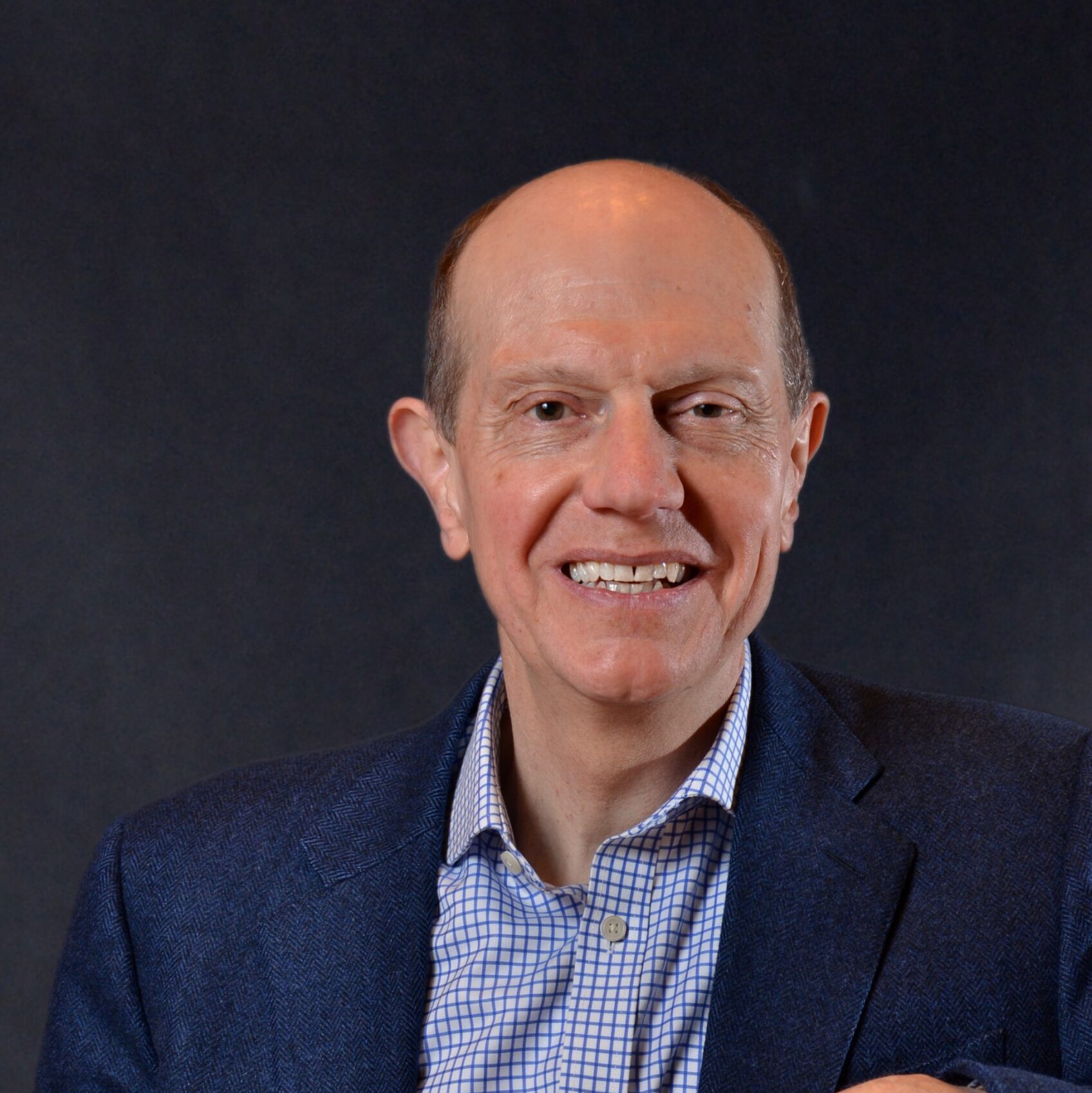 Headshot of Ray Eitel‑Porter